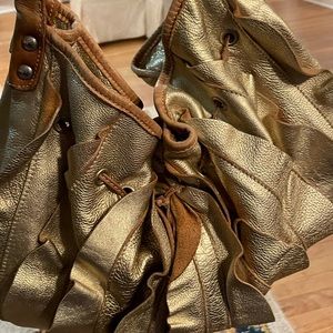 Authentic designer bag in soft beautiful gold leather lamb skin